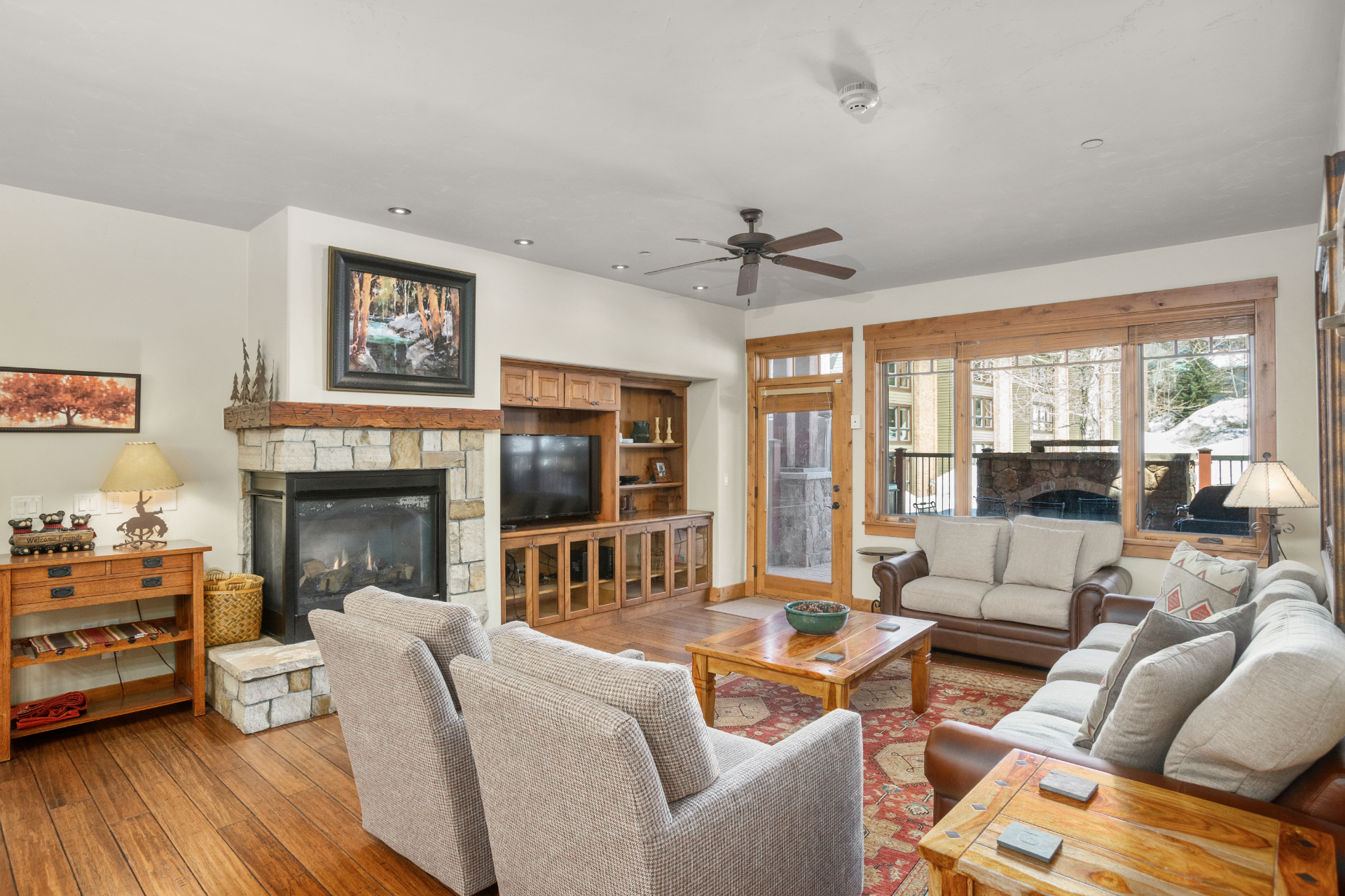 Large living room with gas fireplace & HDTV