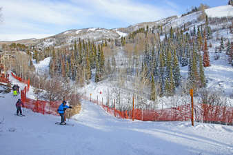 Gentle grade downhill ski in access from the left, ski out straight ahead