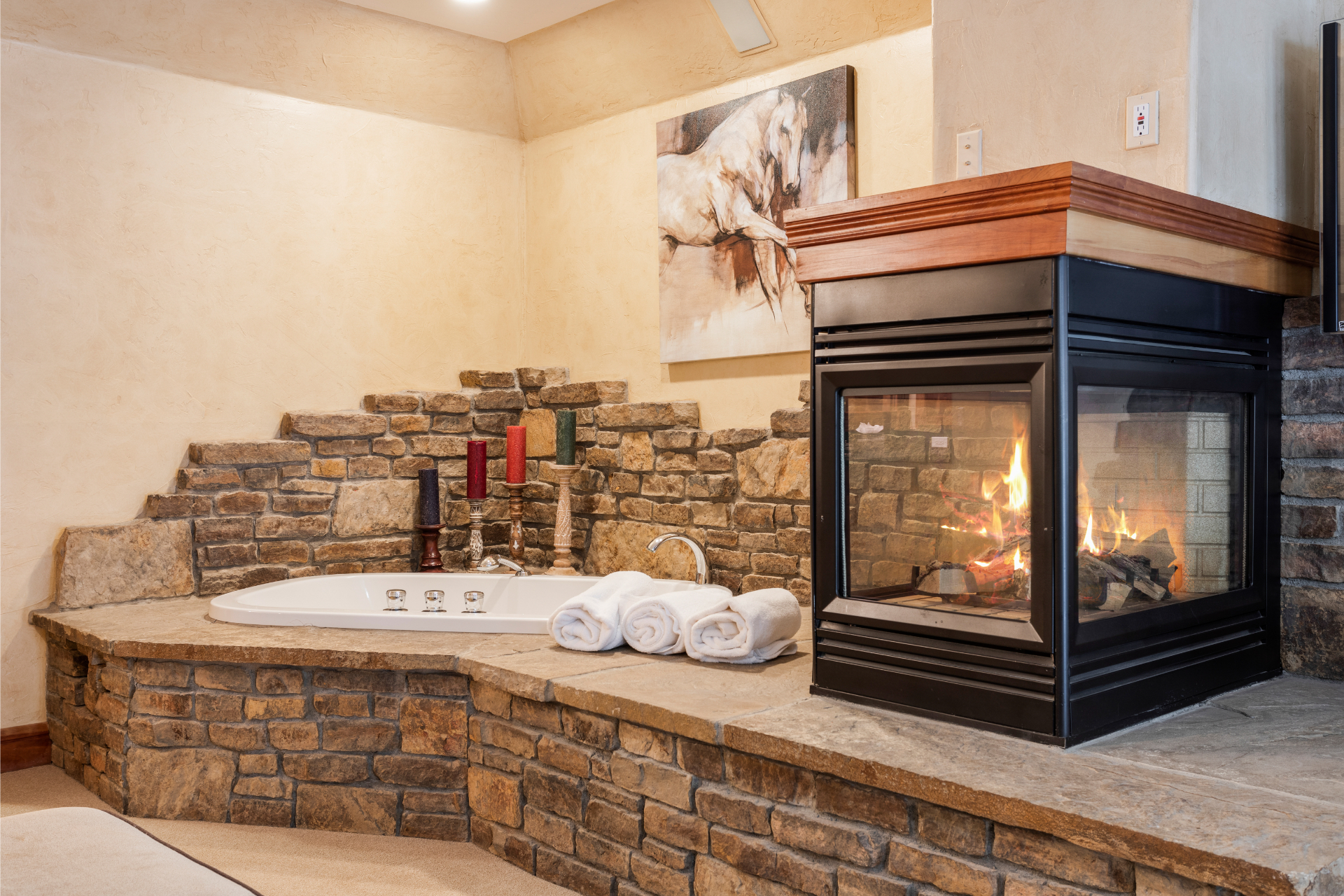 Fireplace and Jacuzzi Tub in the 1st Bedroom suite