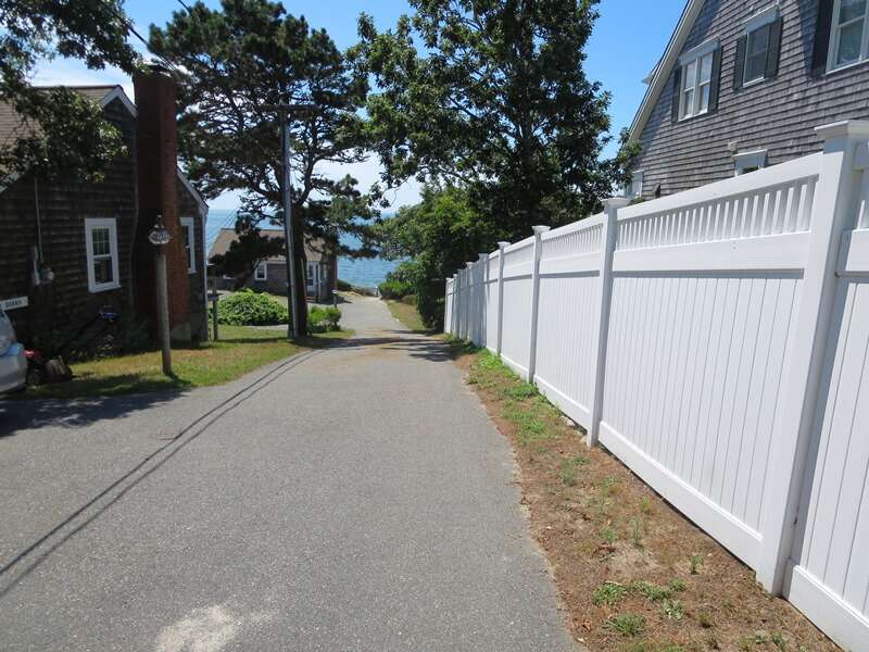Just follow along the fence to the stairway to the beach - Sea Mist Lane Chatham Cape Cod New England Vacation Rentals