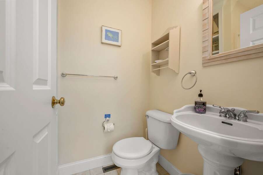 1st floor bathroom off of the hall with a shower - 24 Sea Mist Lane Chatham Cape Cod New England Vacation Rentals