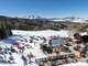 Enjoy the sun or hot drink in one of the many on-mountain restaurants Telski provides