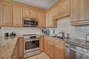 Full Size Kitchen with Stainless Steel Appliances and extra seating at the Breakfast Bar