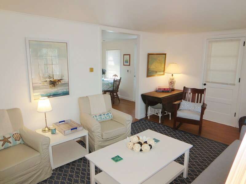 View from the living room to the kitchen and porch - 41 Whip O Will Harwich Cape Cod - New England Vacation Rentals