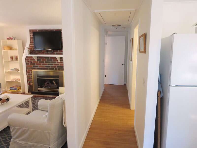 Hallway between kitchen and living area to bedrooms and bathroom.  41 Whip O Will Harwich Cape Cod - New England Vacation Rentals