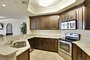 The Fully Equipped, Spacious Kitchen has Stainless Steel Appliances and Granite Counter Tops