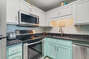 Full Size Kitchen with Stainless Steel Appliances