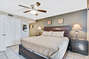 Master Bedroom has a King Size Bed with a Private Master Bath and Balcony Access