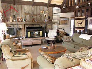 Main Living Room with Wood Burning Fireplace, Vaulted Ceilings.