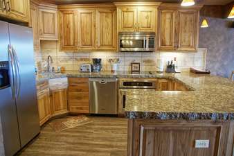 Stainless steel appliances and beautiful cabinetry