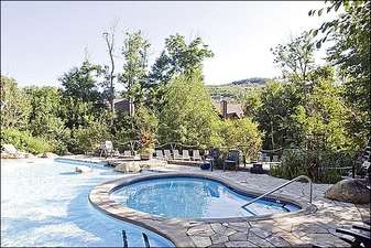 The Common Area Swimming Pool and Hot Tub are Available in the Summer Months