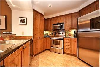 Fully Equipped Kitchen has Stainless Steel Appliances