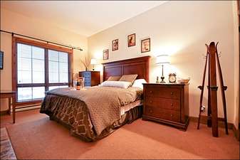 Master Bedroom has a King Bed and Rustic Decor