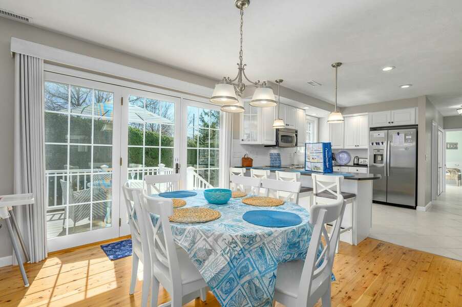 Dining area open to kitchen and will seat ten total guests - 9 Wilfin Road South Yarmouth Cape Cod - Four Shore - NEVR