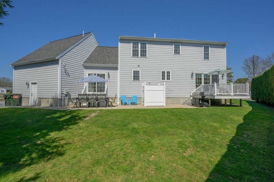 Back Yard with outdoor dining and outdoor shower - 9 Wilfin Road South Yarmouth Cape Cod - Four Shore - NEVR