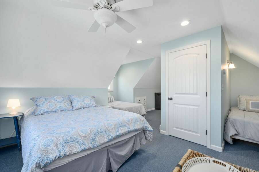 Fifth bedroom with door leading to stairway and alternate entrance that originates in the garage - 9 Wilfin Road South Yarmouth Cape Cod - Four Shore - NEVR