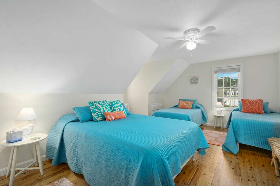Upper level bedroom with one Queen sized bed and two Twin sized beds - 9 Wilfin Road South Yarmouth Cape Cod - Four Shore - NEVR
