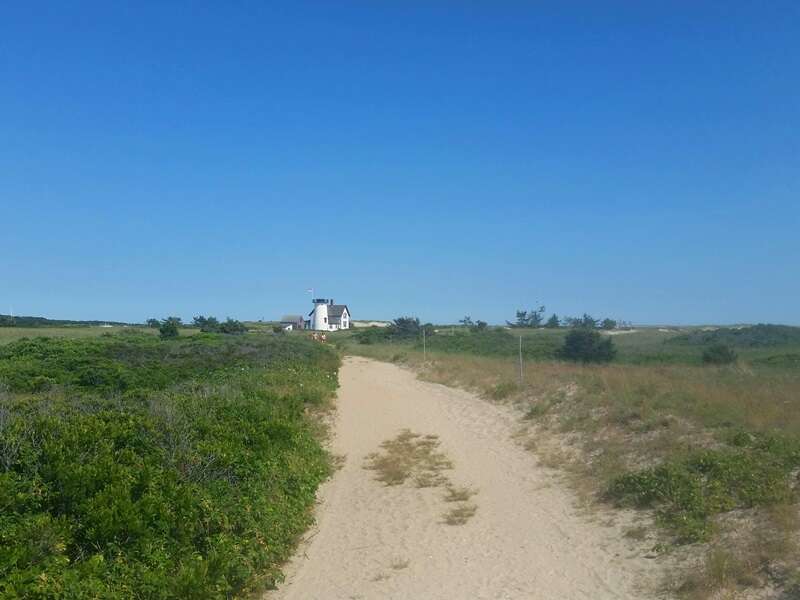 Walk thru the dunes about 1 mile to find the treasured Stage Harbor Lighthouse! Chatham Cape Cod - New England Vacation Rentals