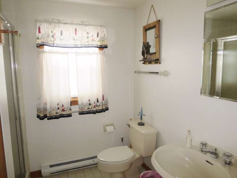 First floor bathroom with shower off hall of Kitchen and 1st flr bedroom- 180 Hardings Beach Road Chatham Cape Cod - New England Vacation Rentals