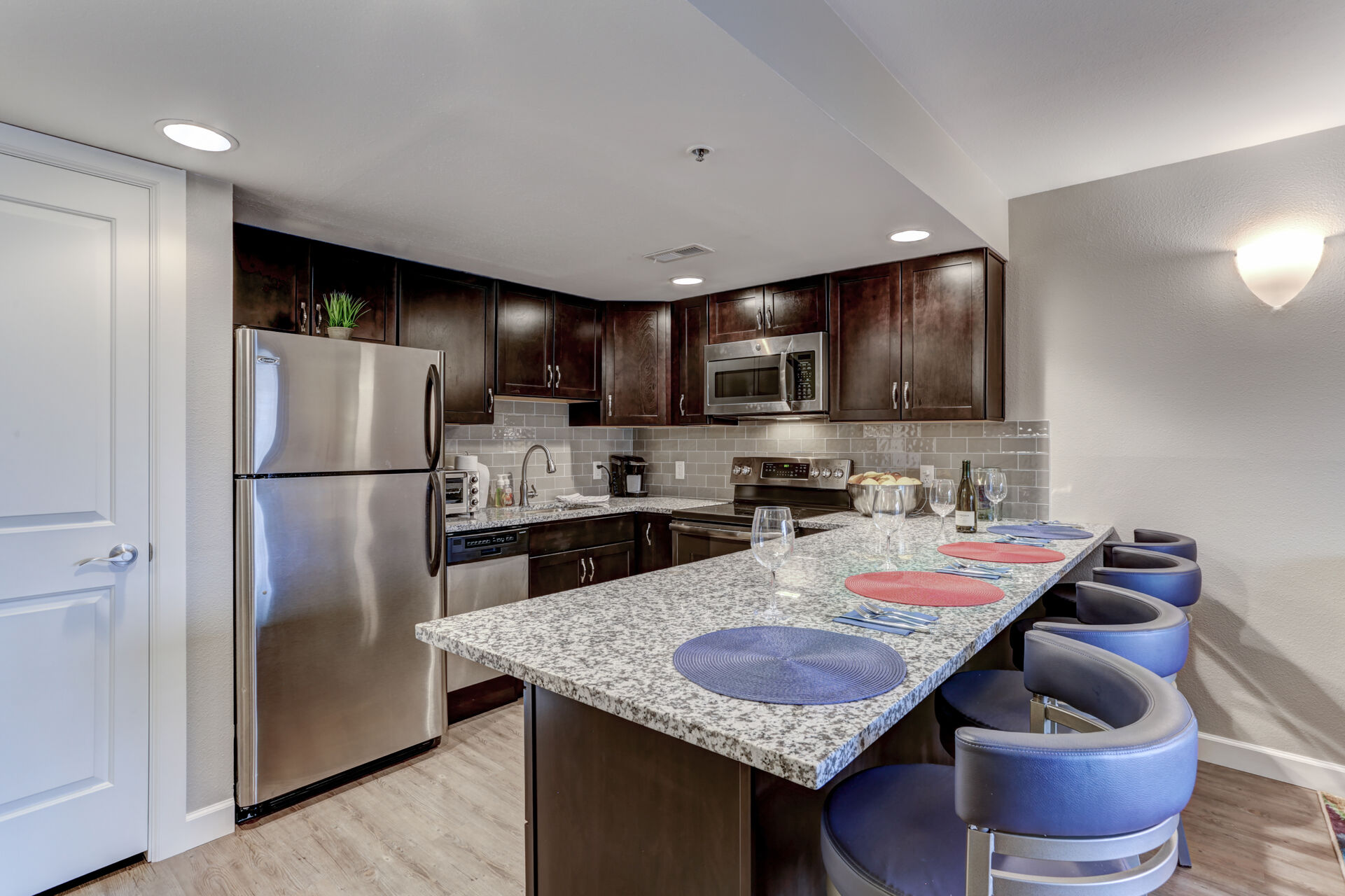 Fully Equipped, Newly Remodeled Kitchen with Stainless Steel Appliances, Bar Seating for 4