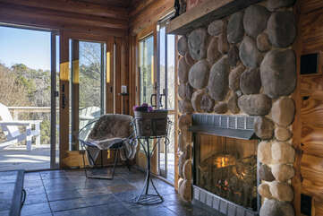 Relax by the Upstairs Great Room Propane Fireplace