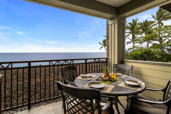 Spacious ocean front lanai with table and seating for 4.