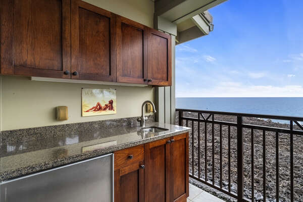 Main lanai with wet bar, complete with sink and fridge.