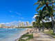 Queens Beach with shade trees next to the saltwater pool