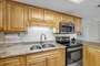 Updated Kitchen has Stainless Steel Appliances, New Cabinets and Granite Counter Tops.