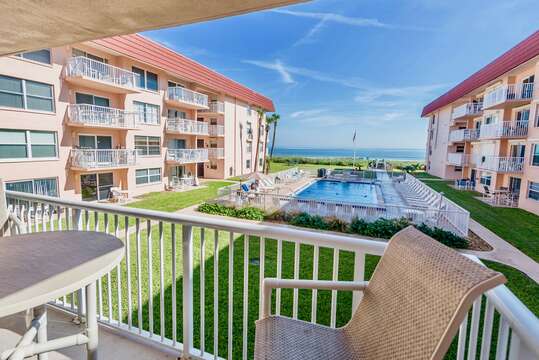 Enjoy views of the ocean and pool right from your balcony.