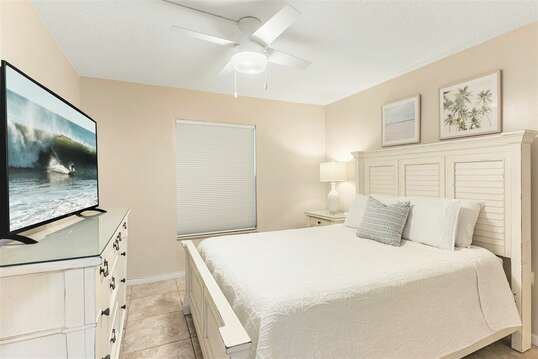 Guest Bedroom with queen bed, closet & flatscreen TV