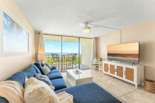 Step onto your private oceanfront balcony from the condo