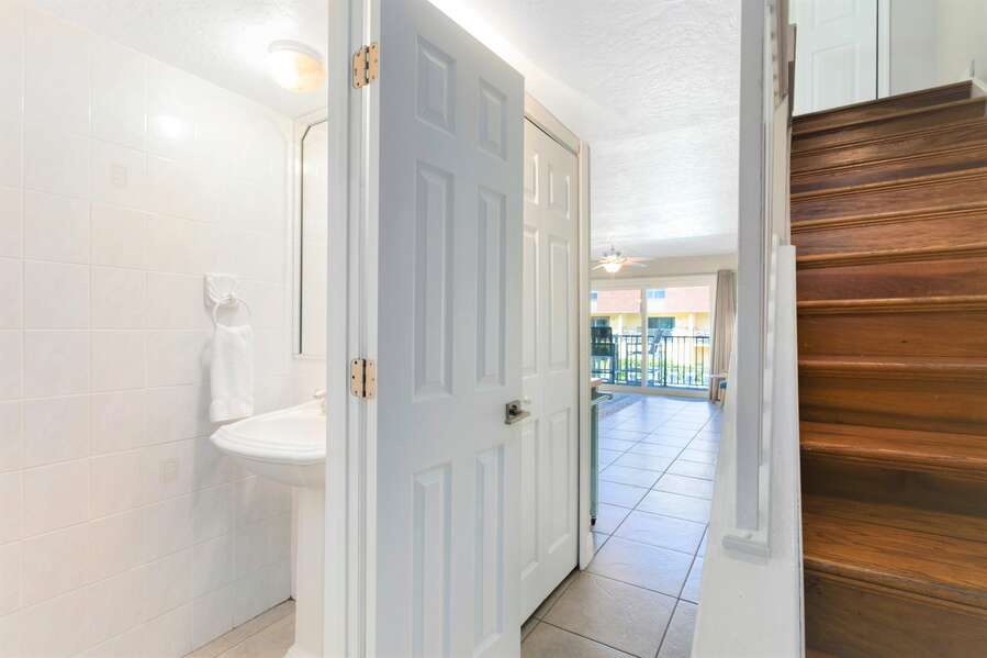Two level unit has an interior staircase as well as a powder room on the main level