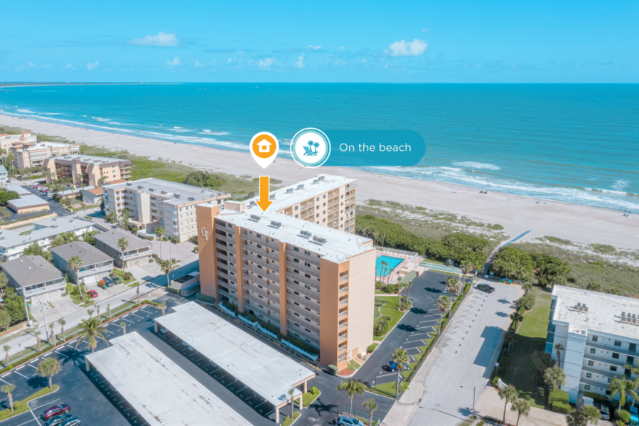 Stunning aerial view of the beachfront, showcasing the prime location of the property.