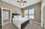 Bedroom with ceiling fan and nightstands