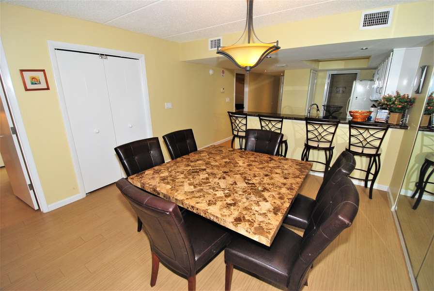 Dining Area Seat for 6 at Table; Additional Seating at Bar Area