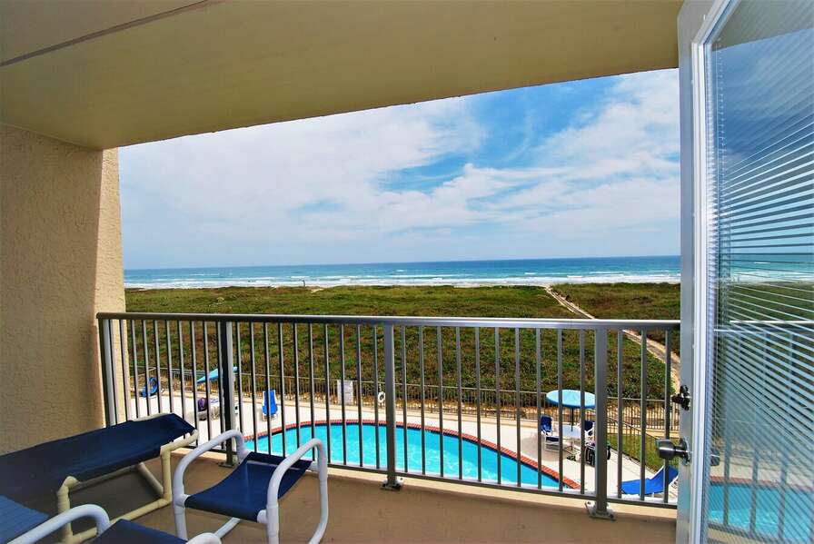 Large beachfront balcony over looking the heated pool and the Gulf of Mexico