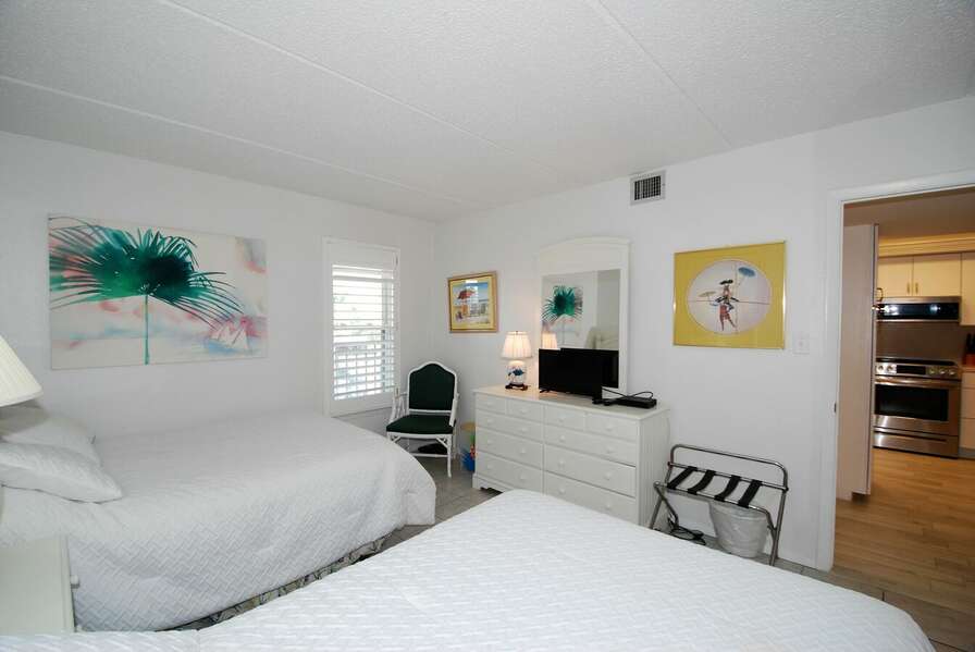 Guest bedroom with 2 doubles, right off of the kitchen area