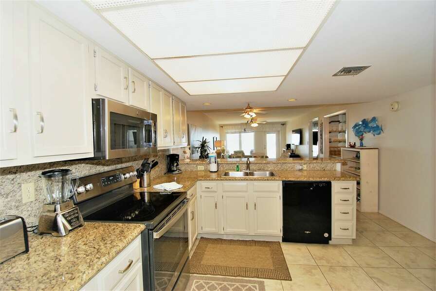 fully equipped kitchen with updated appliances