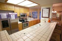 Large kitchen is open to living and dining rooms