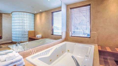 Attached bathroom to bedroom 3, includes bath tub and walk in shower
