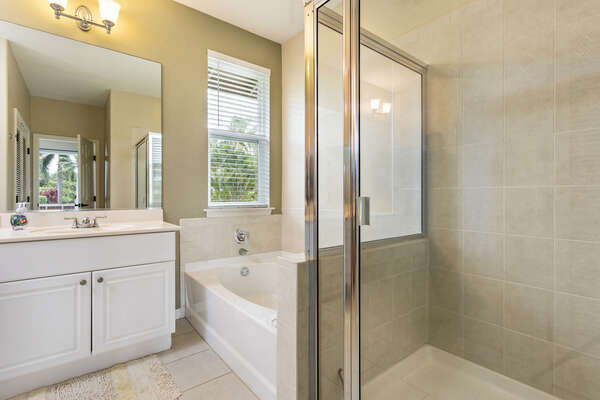 Master bathroom offers separate shower/tub