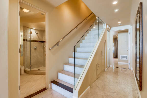 Stairs to Upper Level with Full Bath on the side