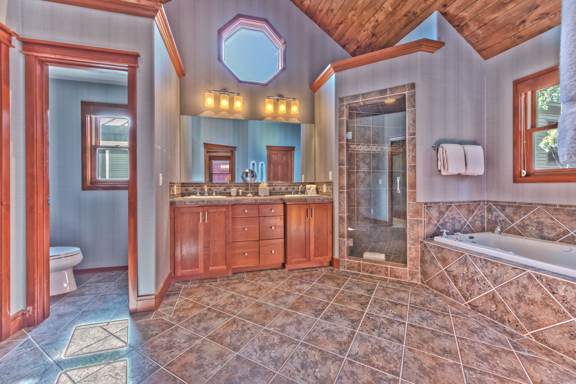 Spacious Master Bath with Dual Sinks, Jetted Tub and Large Tile Shower with Two Shower Heads