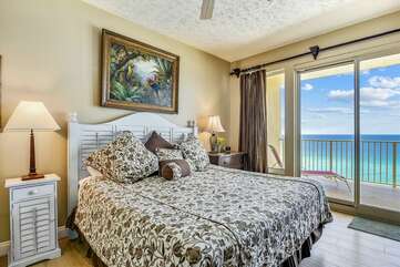 (King) Master bedroom with balcony access and stunning view of the Gulf!