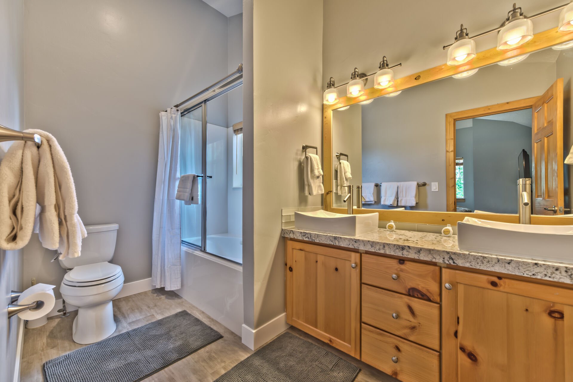 Spacious Upper Level Grand Master Bath with Dual Sinks and a Tub/Shower Combo