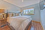 Master Bedroom 2 on the Upper Level with a King Bed, Full Private Bath with a 50