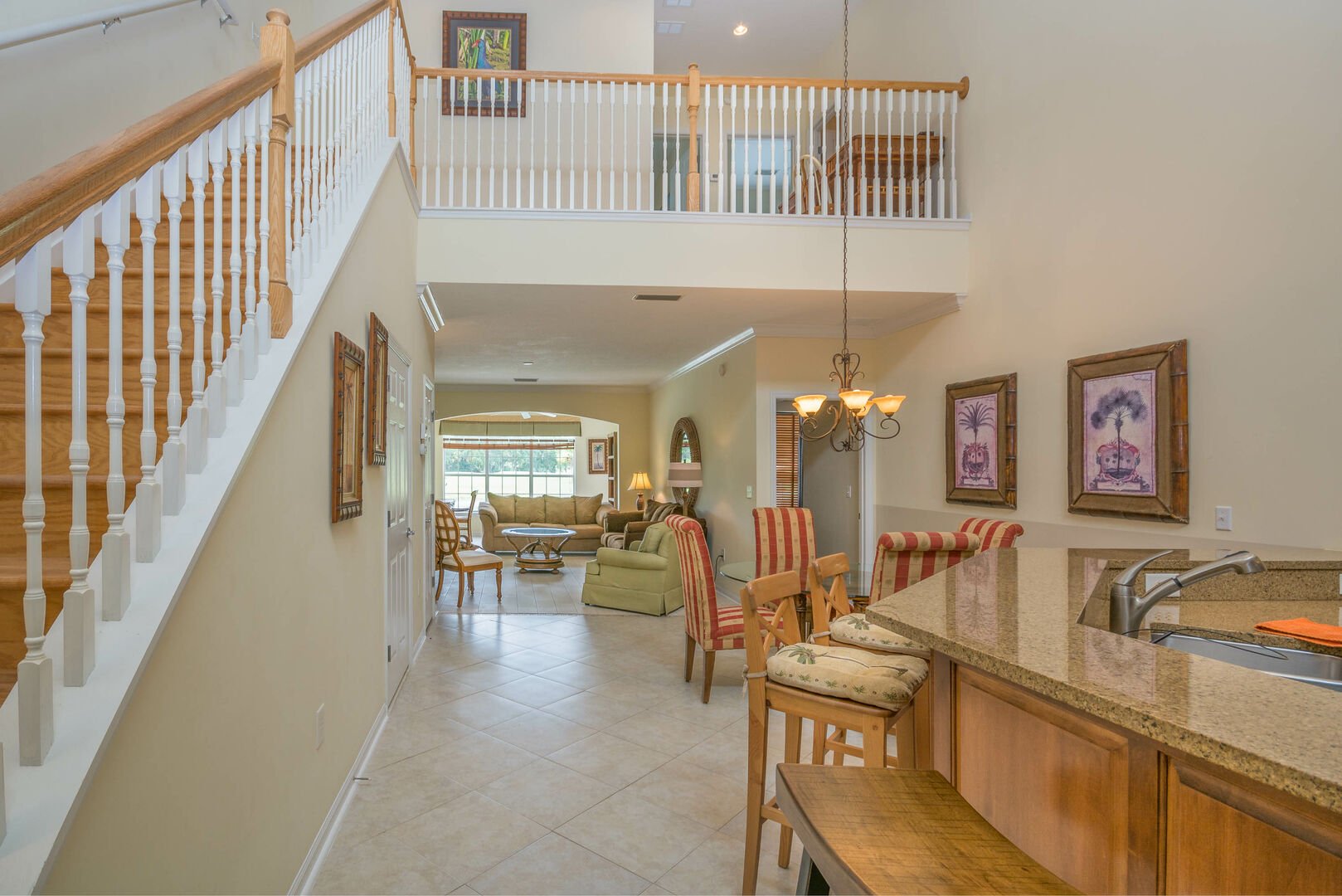 Stairway of this new Smyrna beach Florida vacation home leading to upstairs guest bedrooms