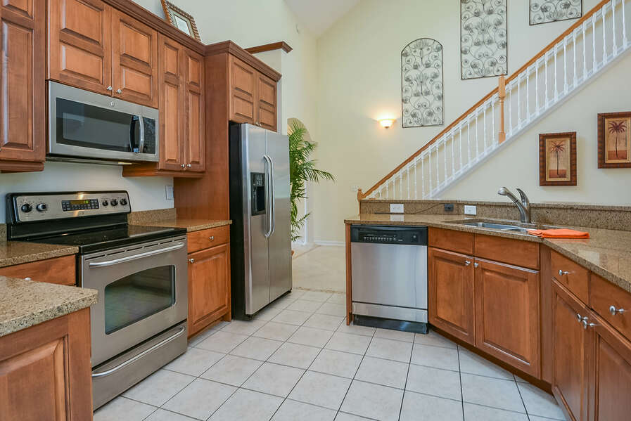 Fully updated kitchen with granite countertops and stainless steel appliances.