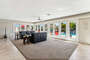 Large open living space! Stunning views of the resort style backyard and pool!